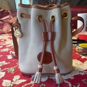 Beautiful Vintage Dooney & Bourke bucket Tan and Brown Mini Drawstring Bag 1980s